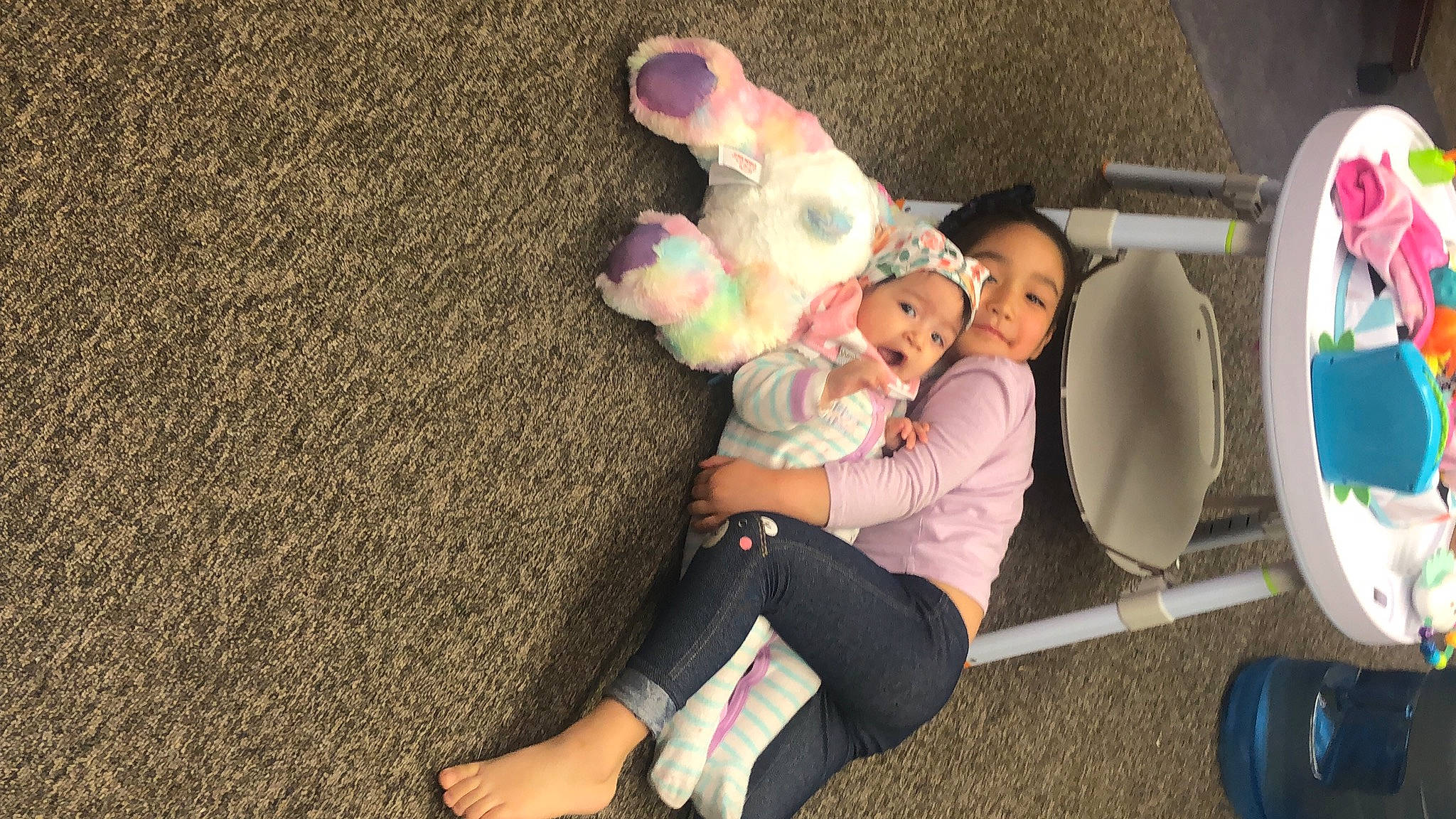 Tesi joined the competition — help win amazing prizes! baby, balloon, child, event, flooring, foot, fun, happy, headwear, human_leg, leisure, person, pink, play, recreation, sitting, smile, sock, thigh, toddler