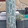 backyard, blanket, canine, cushion, daytime, dog, furniture, lounge, outdoor, patio, pet, pillar, plant, potted_plant, relaxing, resting, stone_wall, terrace, two_dogs, wicker_furniture