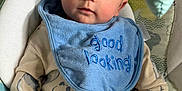 James Bleu is registered to the contest to win money with this photo: baby, infant, blue_bib, good_looking_text, onesie, panda_print, baby_seat, patterned_cushion, child, portrait, cute, young_child, indoor, soft_lighting, hand, face, eyes, clothing, comfort, relaxed