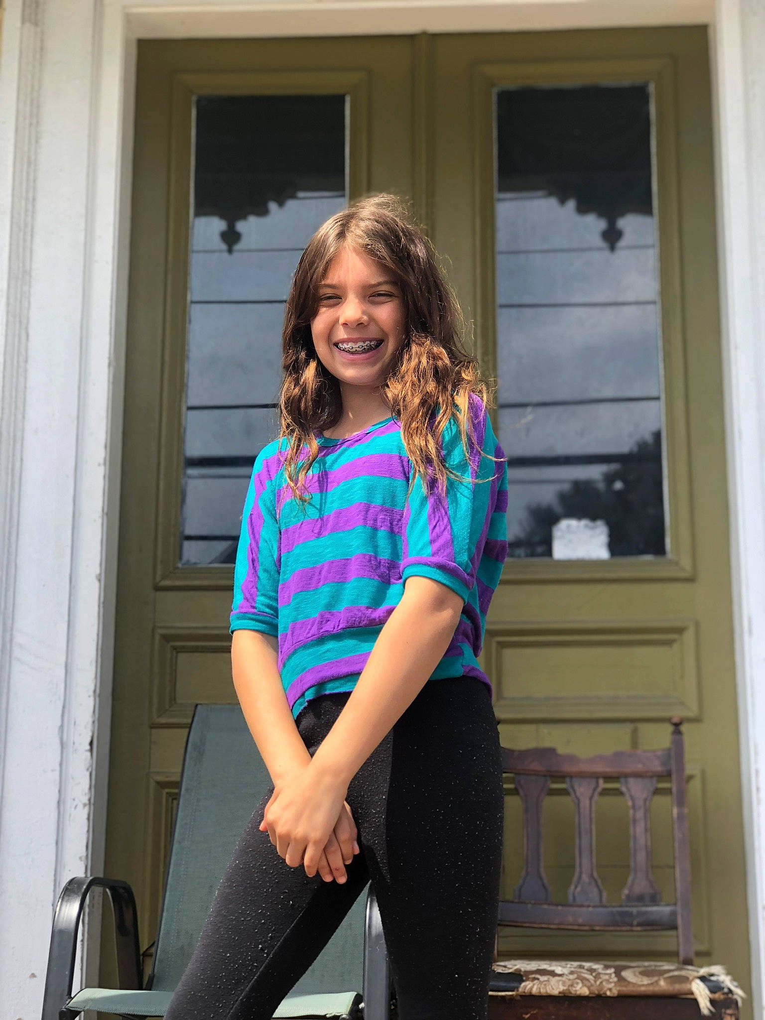 Jaiyana joined the competition — help win amazing prizes! abdomen, blue, brown_hair, clothing, electric_blue, joy, knee, leg, long_hair, outerwear, pattern, person, photo_shoot, photography, shoulder, sitting, smile, standing, t_shirt, thigh