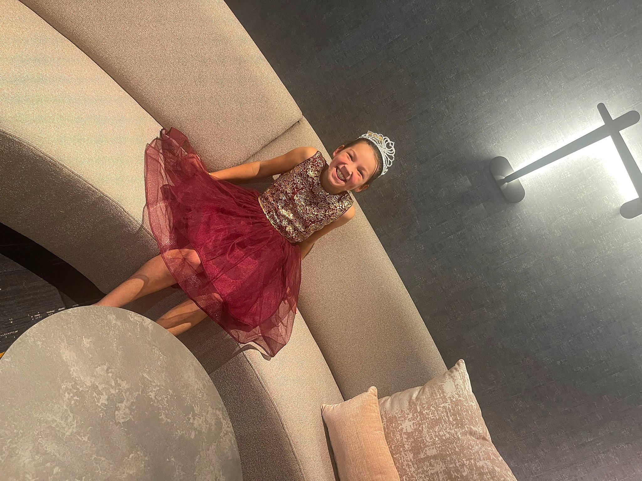 Layla is registered to the contest to win money with this photo: clothing, comfort, couch, elbow, eyewear, fashion_accessory, fashion_design, flash_photography, hand, human_leg, interior_design, joy, knee, lighting, magenta, metal, person, purple, room, thigh