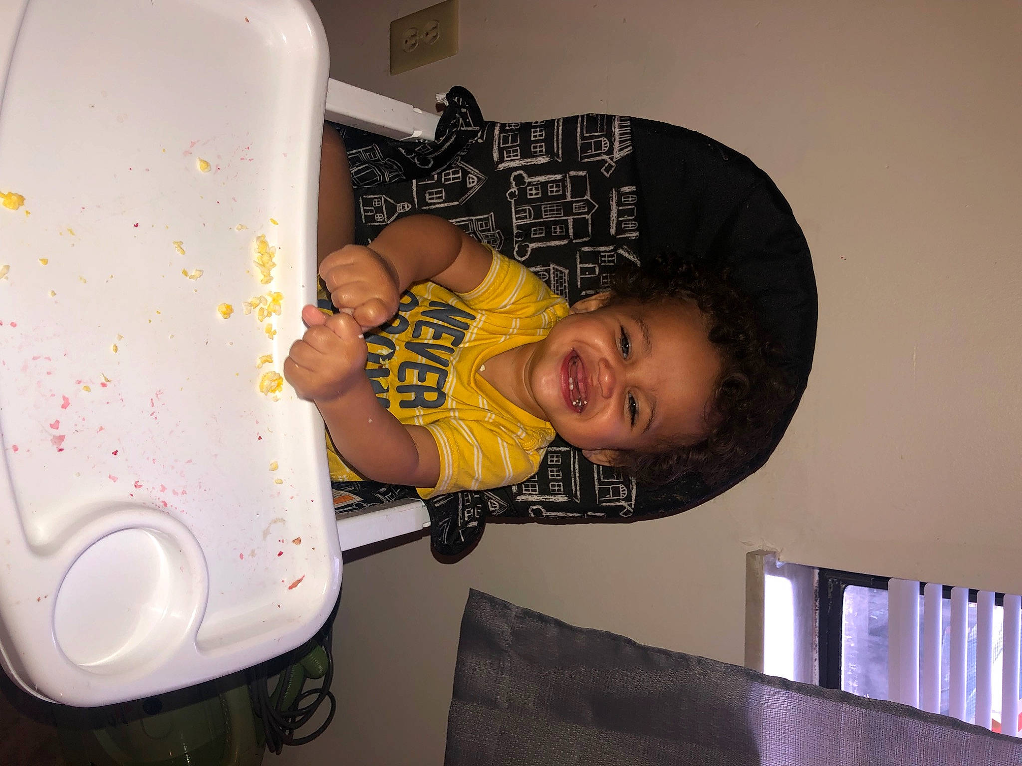 Jamir is registered to the contest to win money with this photo: baby, baby_toddler_clothing, chair, child, comfort, fun, hat, joy, lighting_accessory, person, plastic, room, smile, t_shirt, toddler