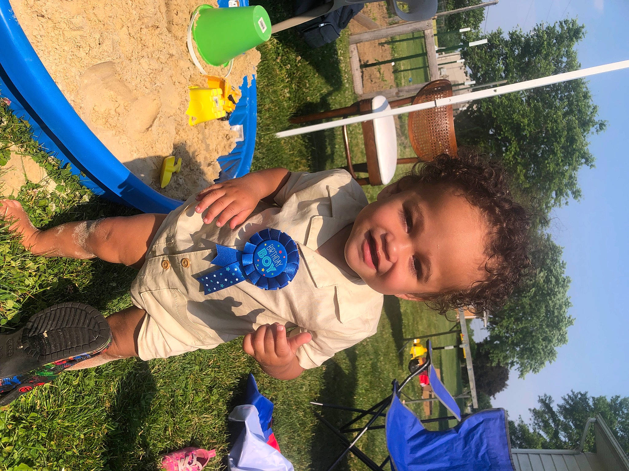Jamir joined the competition — help win amazing prizes! blue, child, city, electric_blue, fun, grass, green, happy, joy, leisure, nature, outdoor_play_equipment, people_in_nature, person, plant, pole, recreation, sky, smile, summer