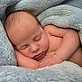 Trustyn joined the competition — help win amazing prizes! baby, newborn, sleeping, blanket, blue_blanket, soft_texture, infant, skin, peaceful, cozy, wrapped, cute, resting, child, toddler, portrait, closeup, hands, face, arm