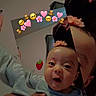 Jamaya joined the competition — help win amazing prizes! baby, flower_headband, mirror_effect, emoji_overlay, hearts, teddy_bears, flowers, adult_hand, indoor, person, close_up, portrait, cute, child, expression, head, face, holding, soft_lighting, playful