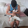Pongo participe au concours pour gagner de l'argent avec cette photo : man, cat, indoor, couch, pillow, white, blue_shirt, sitting, pet, feline, relaxing, wooden_floor, home, casual, furniture, person, animal, cozy, living_room, comfort