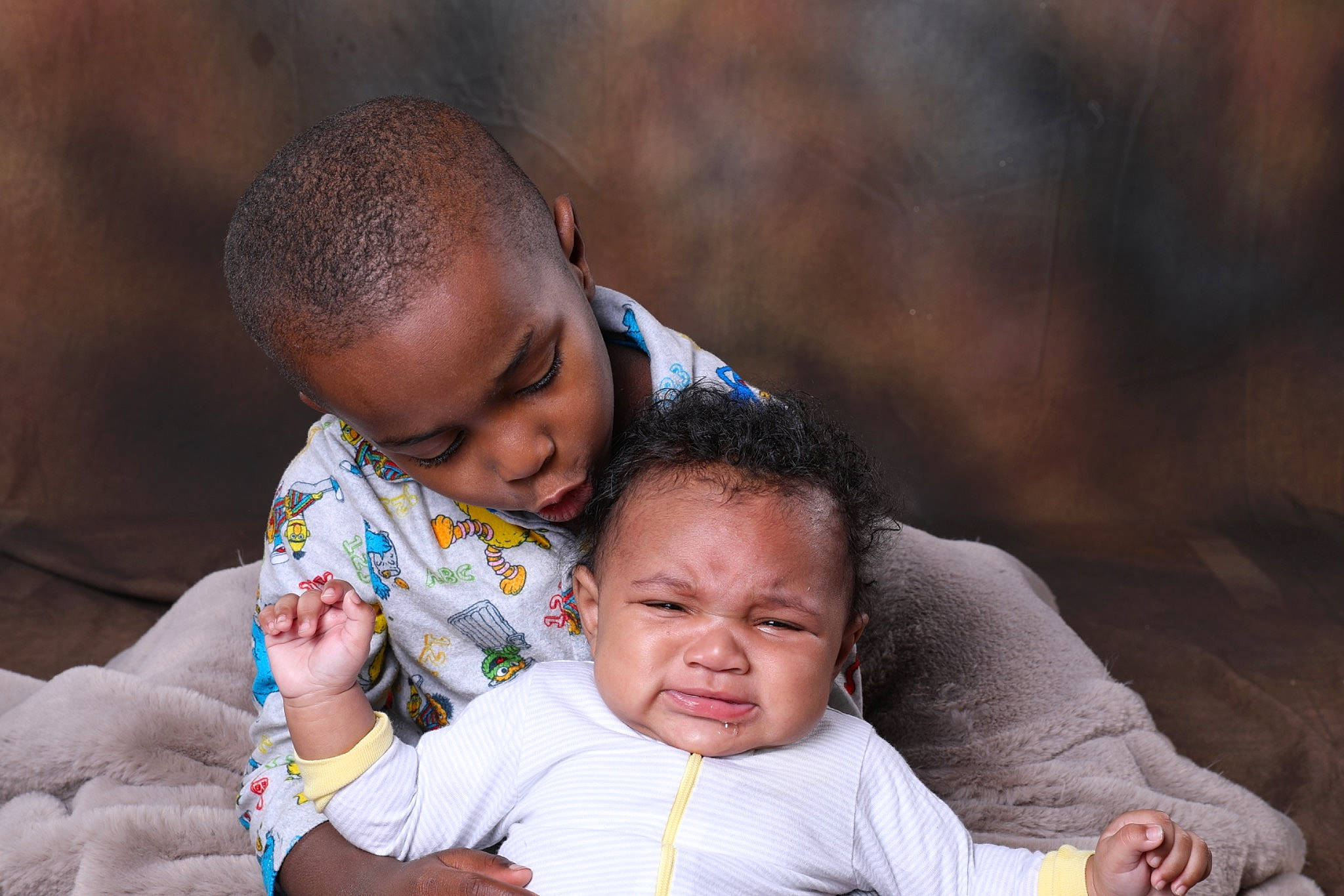 Raekwon is registered to the contest to win money with this photo: adaptation, arm, baby, cheek, face, flash_photography, fun, grass, hand, happy, head, interaction, iris, leaf, leisure, nose, people_in_nature, person, sharing, skin