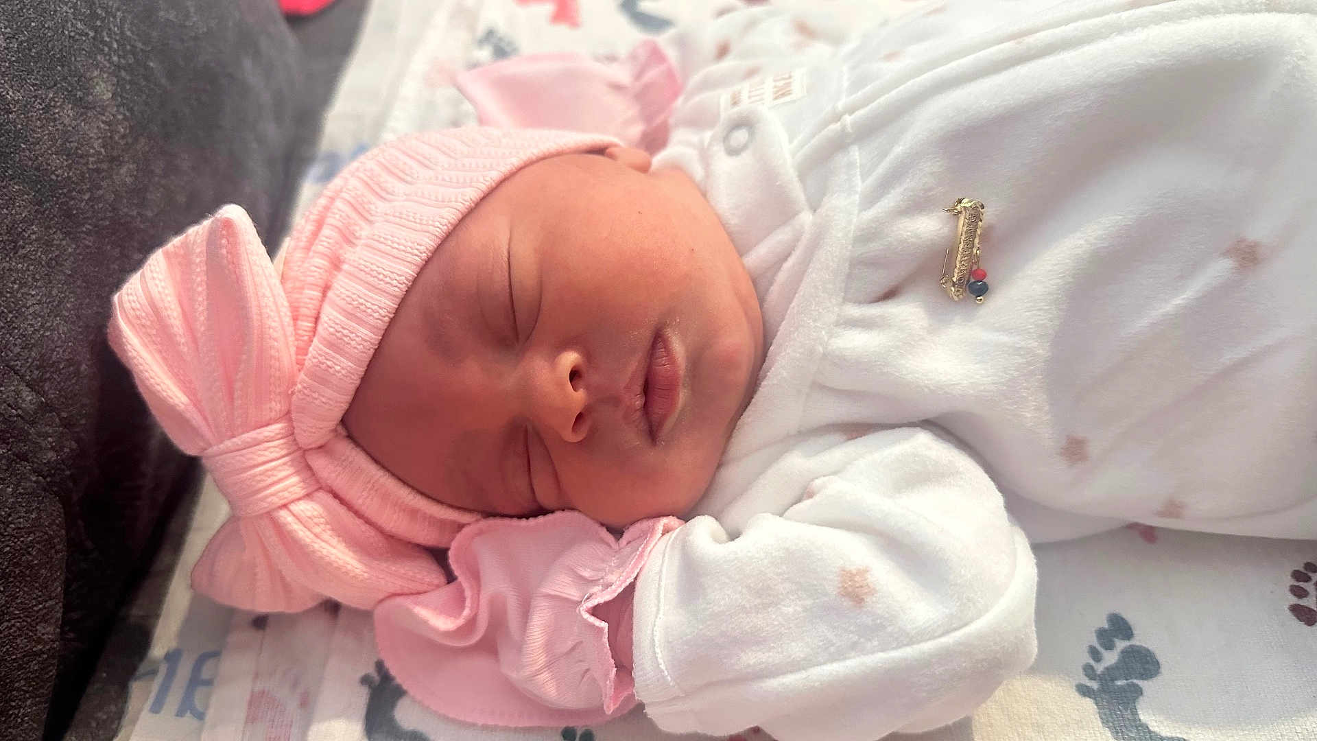 Jaylania joined the competition — help win amazing prizes! baby, newborn, sleeping, pink_hat, bow, pajamas, blanket, footprint_pattern, infant, cute, peaceful, soft, clothing, headwear, sleep, rest, closeup, adorable, child, portrait