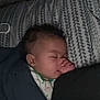 Khylan is registered to the contest to win money with this photo: baby, sleeping, blanket, bed, pillow, pattern, hand, face, indoors, cozy, child, peaceful, rest, comfort, person, cute, nighttime, soft, hair, clothing