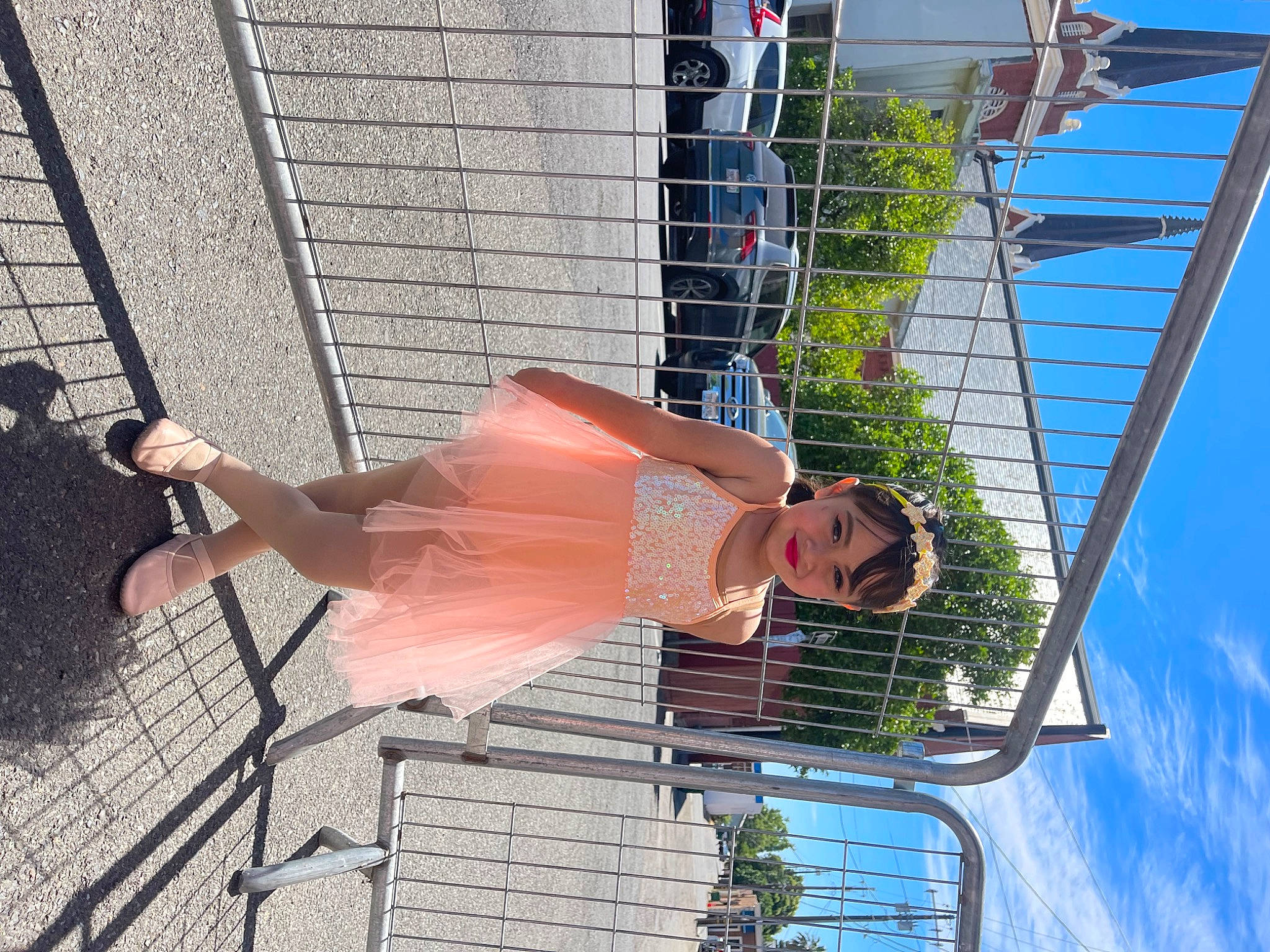 Genesis Cruz is registered to the contest to win money with this photo: blue, cloud, daytime, facade, fun, human_leg, joy, leisure, line, person, pole, reflection, shadow, sky, smile, thigh, tree, water, wire