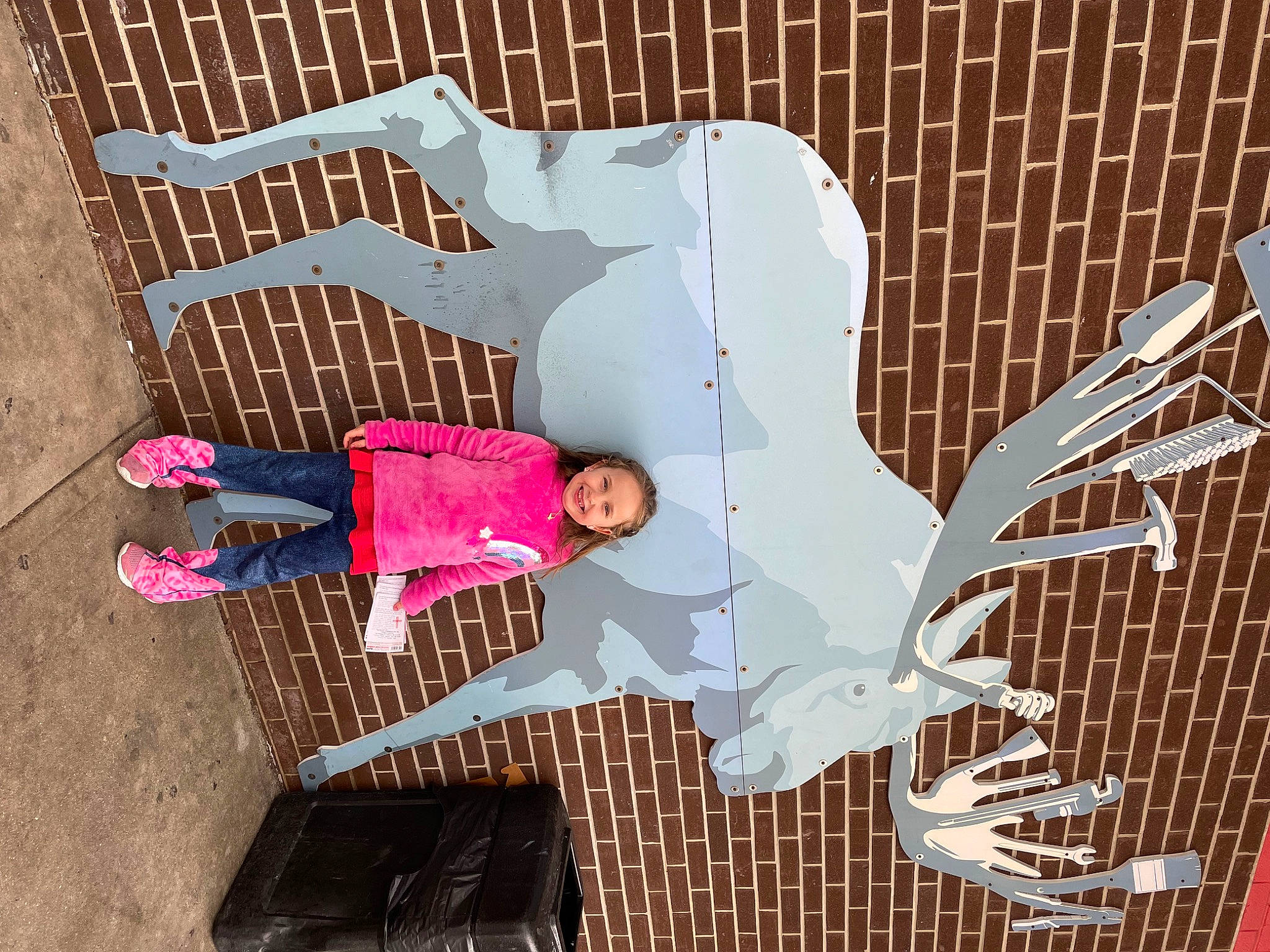 Madelynn joined the competition — help win amazing prizes! art, child, concrete, joy, magenta, metal, pattern, person, pink, smile, toddler, visual_arts, wall, wing, wood