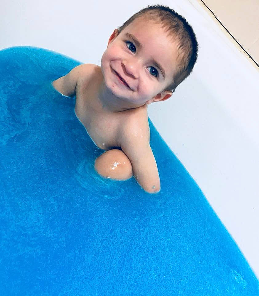 Jahkai is registered to the contest to win money with this photo: baby, ball, blue, child, fun, games, joy, leisure, person, play, recreation, skin, smile, toddler, tummy_time