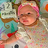 Sophia is registered to the contest to win money with this photo: accessories, baby, bonnet, cap, clothing, cushion, face, furniture, glasses, hat, head, headband, homedecor, newborn, person, photography, portrait, quilt, sunglasses, t_shirt