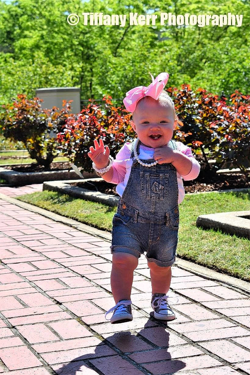 Ava-rae is registered to the contest to win money with this photo: child, flower, headwear, leaf, pattern, person, plant, toddler