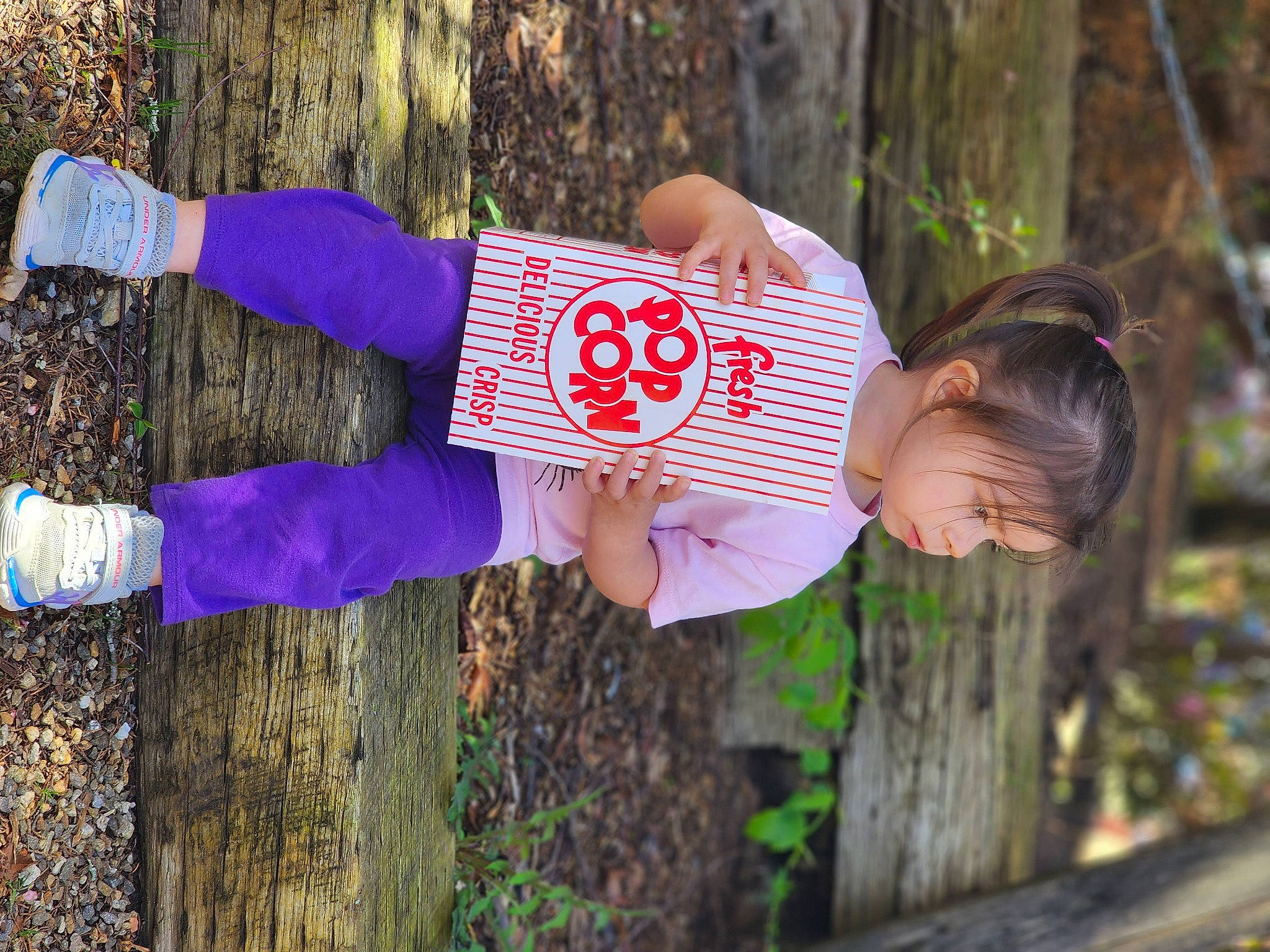 Adelyn is registered to the contest to win money with this photo: child, electric_blue, forest, fun, glove, grass, happy, leaf, leisure, magenta, nature, people_in_nature, person, pink, plant, recreation, soil, spring, tree, wood