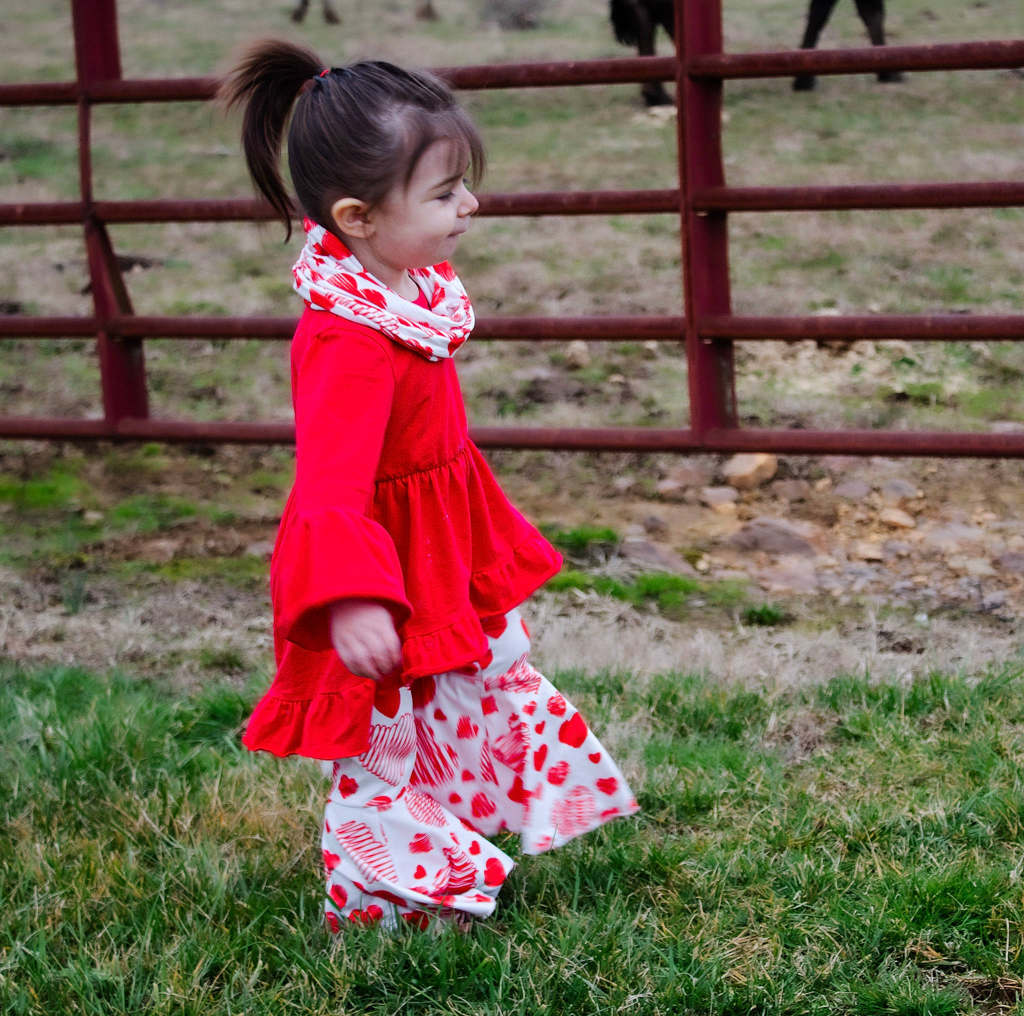 Adelyn joined the competition — help win amazing prizes! baby, baby_toddler_clothing, child, dress, face, fence, fun, grass, grassland, happy, human_body, leisure, magenta, pattern, people_in_nature, person, plant, recreation, sleeve, smile