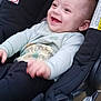 Joshua joined the competition — help win amazing prizes! baby, car_seat, smiling, happy, infant, child, cute, clothing, seat, sitting, face, person, indoors, comfort, joy, laughing, young_child, cartoon, padding, casual