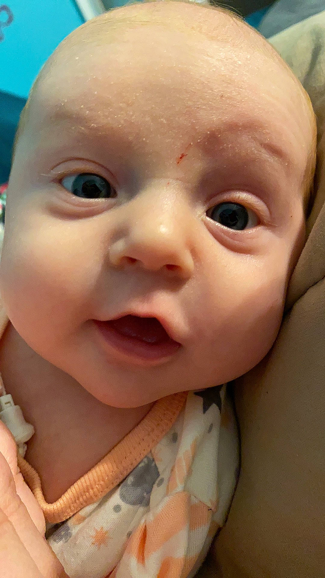 Miley is registered to the contest to win money with this photo: baby, baby_making_funny_faces, cheek, child, chin, close_up, eye, eyebrow, eyelash, face, facial_expression, forehead, head, iris, lip, mouth, nose, person, skin, smile