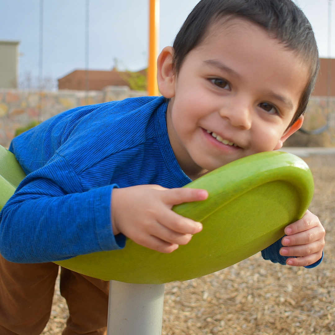 Alonzo joined the competition — help win amazing prizes! child, fun, joy, leisure, outdoor_play_equipment, person, plant, play, playground, public_space, smile, swing, toddler, zucchini
