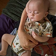 Vivian joined the competition — help win amazing prizes! baby, sleeping, infant, onesie, animal_print, pacifier, arm, hand, plush_toy, elephant, bed, blanket, comfort, rest, child, indoor, soft_lighting, closeup, care, toddler