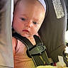 Vivian is registered to the contest to win money with this photo: baby, car_seat, child, infant, seatbelt, blanket, pink_clothing, safety, cute, portrait, indoors, young_child, infant_face, baby_girl, seat, closeup, soft_light, expression, head, skin