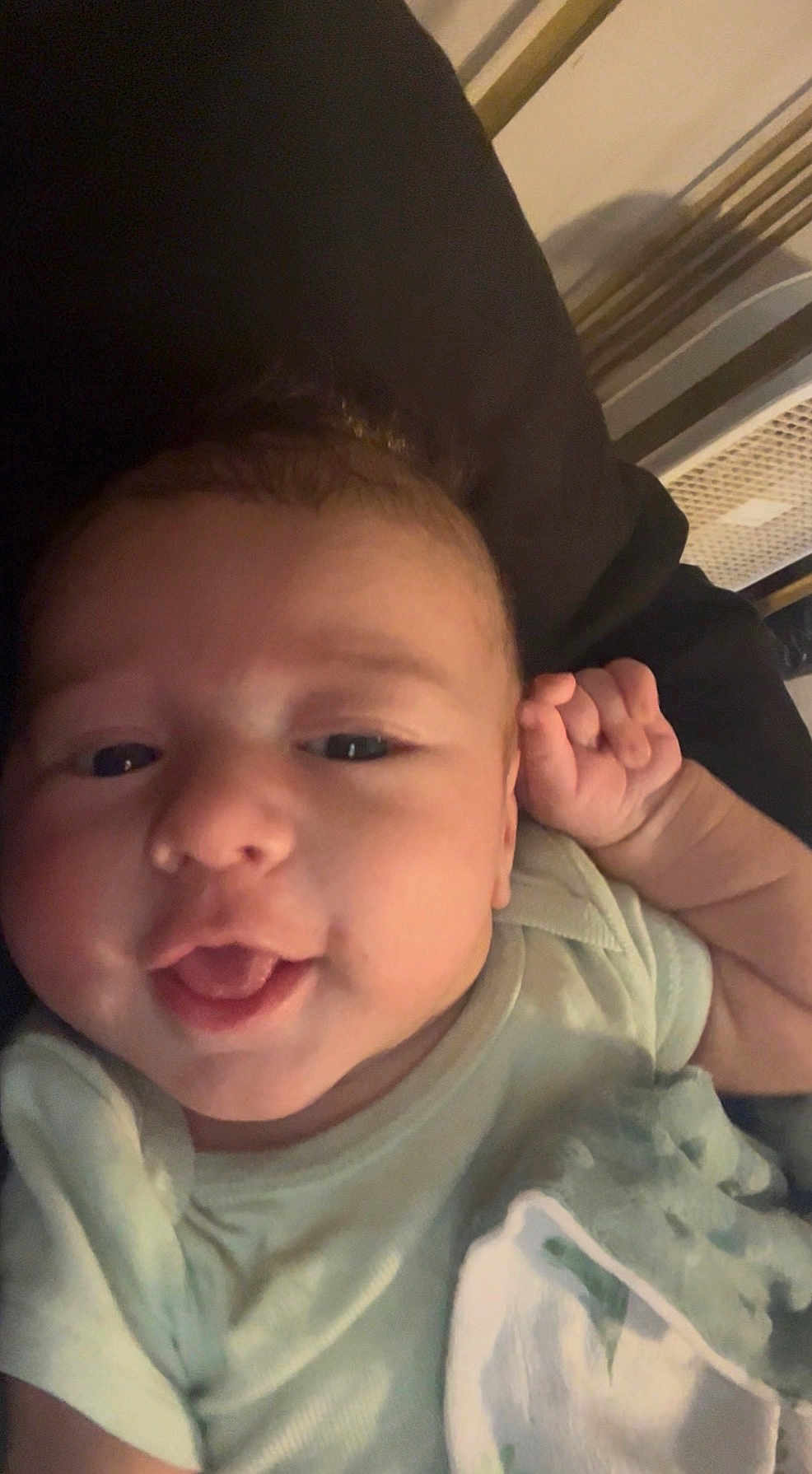 Daxton joined the competition — help win amazing prizes! baby, child, face, smile, onesie, blanket, hand, closeup, infant, cushion, indoor, portrait, cute, happy, skin, person, soft, cozy, young, head