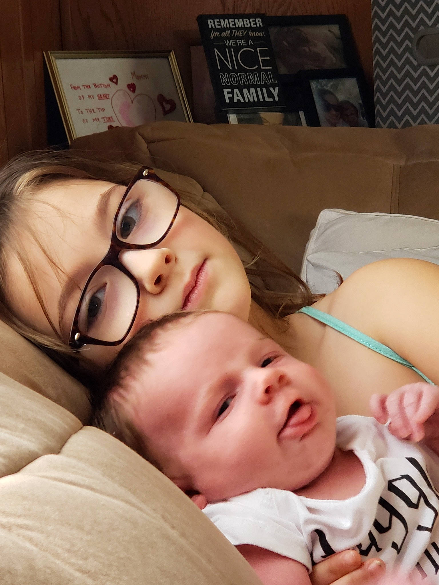Braedon is registered to the contest to win money with this photo: baby, bedtime, birth, child, glasses, nap, person, skin, sleep, toddler