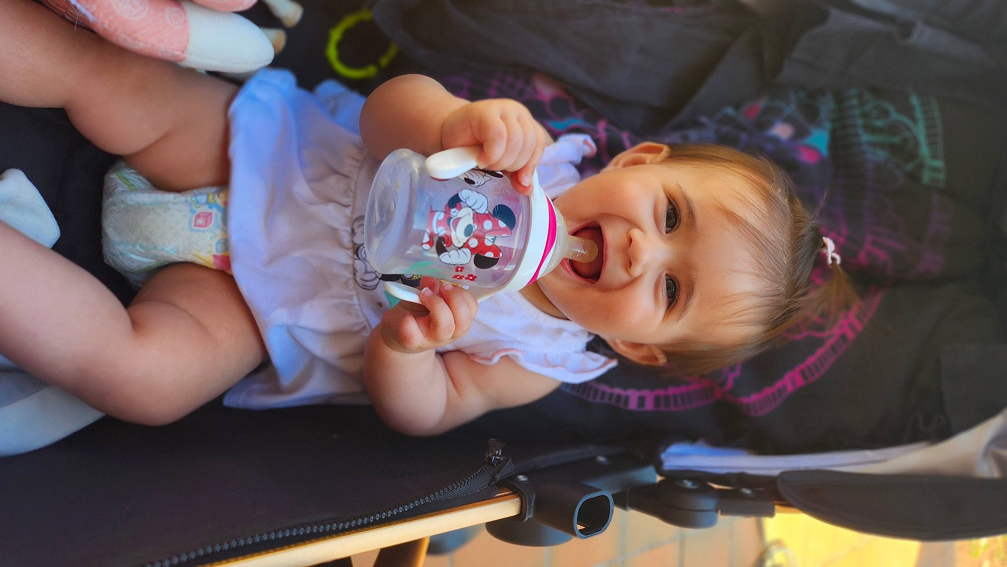 Mara participe au concours pour gagner de l'argent avec cette photo : baby, baby_products, baby_toddler_clothing, cheek, child, event, eye, facial_expression, foot, fun, happy, mouth, person, sitting, skin, smile, thigh, toddler, vacation