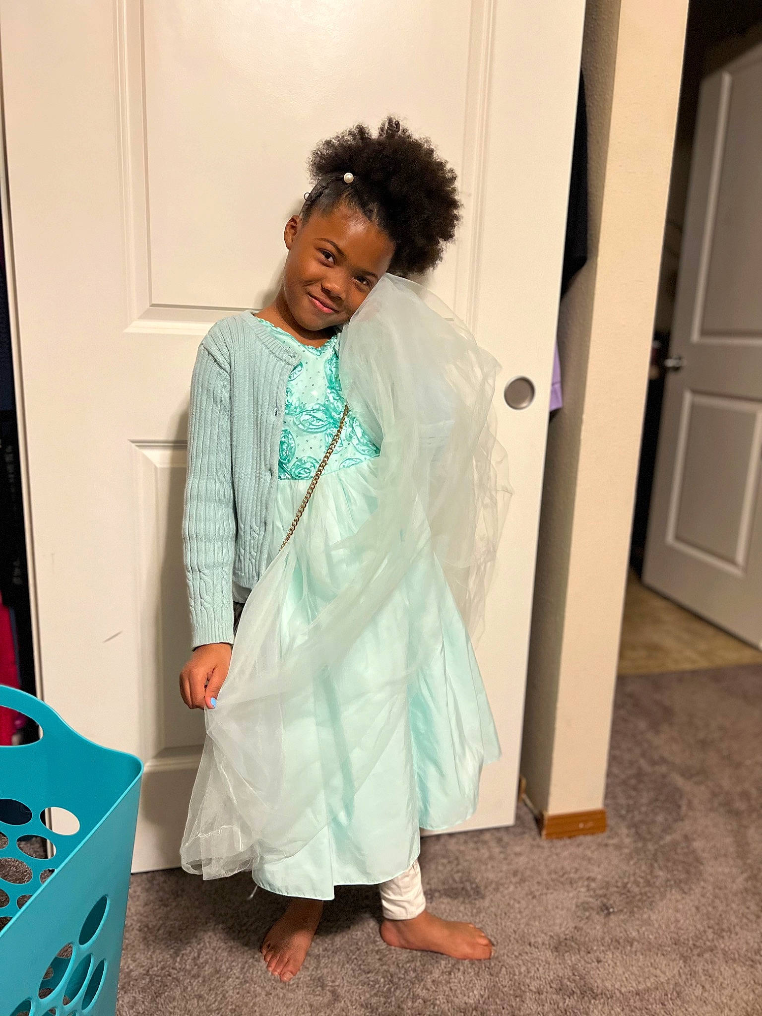 Ayanna is registered to the contest to win money with this photo: child, clinic, costume, door, electric_blue, fashion_design, formal_wear, health_care, health_care_provider, home_door, joy, knee, magenta, person, room, sandal, service, shoulder, sleeve, street_fashion