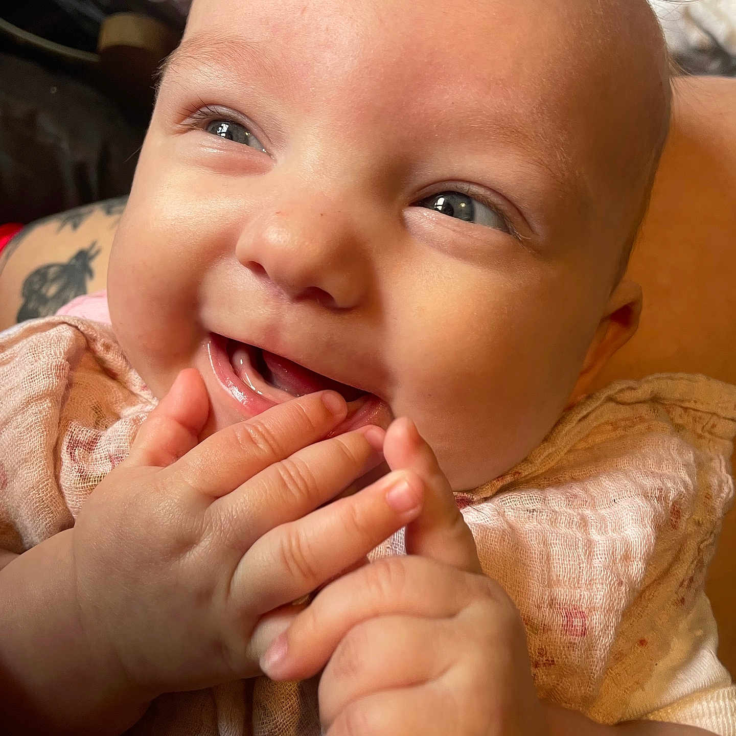 Aria-Louise joined the competition — help win amazing prizes! baby, child, close_up, cute, expression, eyes, face, fingers, hands, happy, indoor, infant, joy, mouth, person, pink_cloth, portrait, skin, smiling, soft_lighting