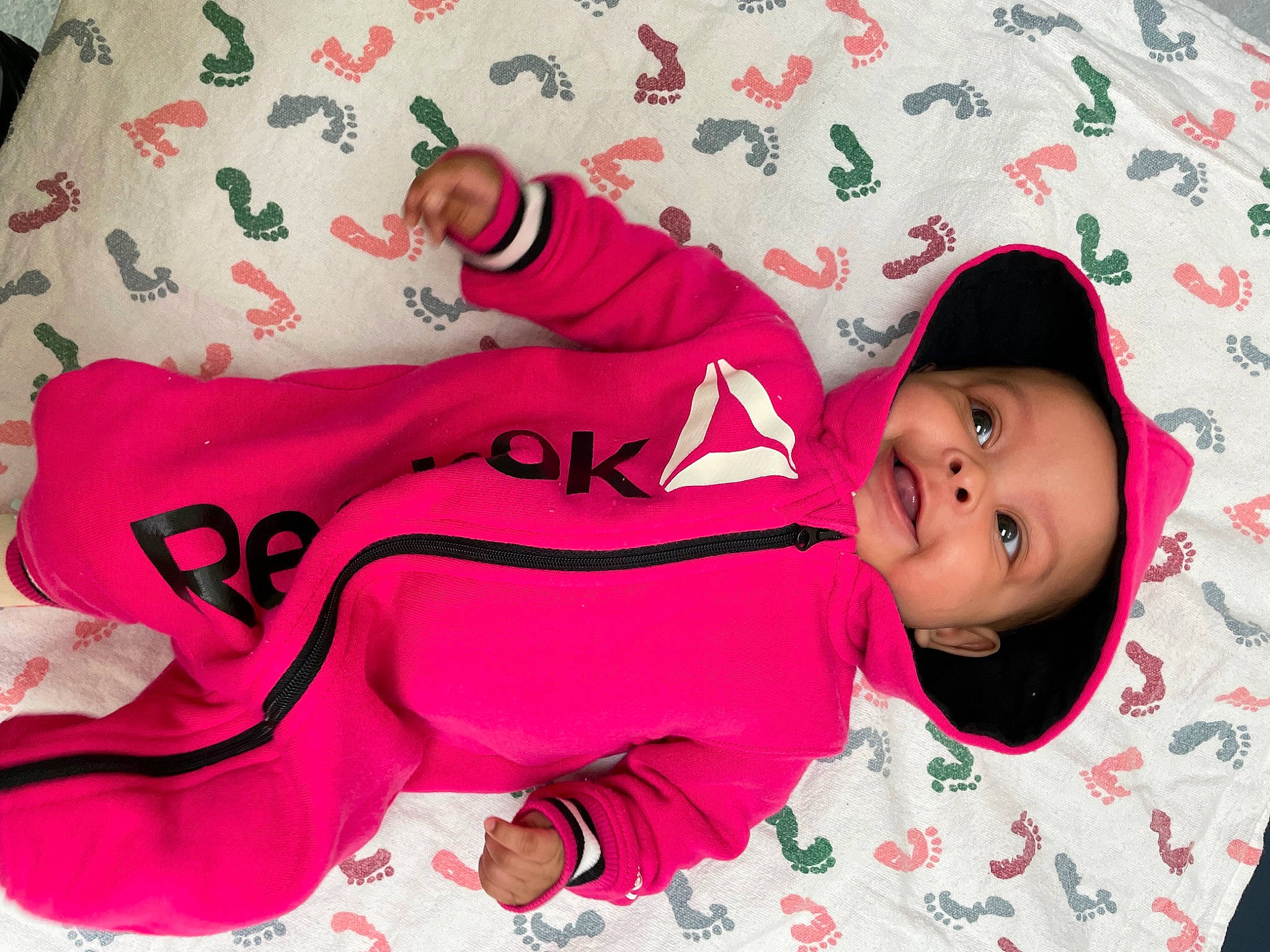 Aloriah joined the competition — help win amazing prizes! baby_products, baby_toddler_clothing, carmine, child, comfort, font, happy, hat, headgear, headwear, linens, magenta, outerwear, pattern, person, pink, play, skin, sleeve, smile