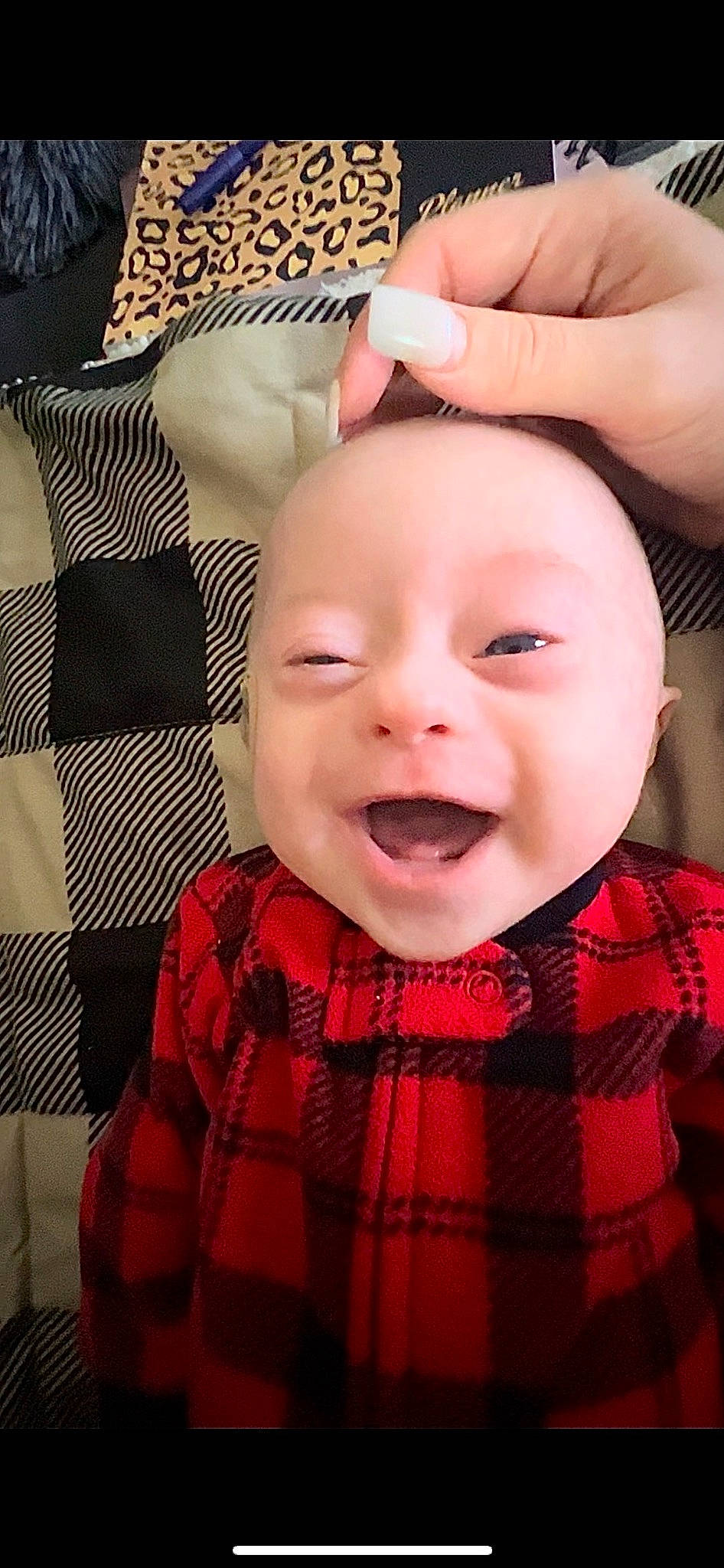 Lucian joined the competition — help win amazing prizes! baby, baby_laughing, baby_toddler_clothing, cheek, chin, collar, eyelash, gesture, happy, head, lip, nose, pattern, person, pink, plaid, skin, sleeve, smile, tartan
