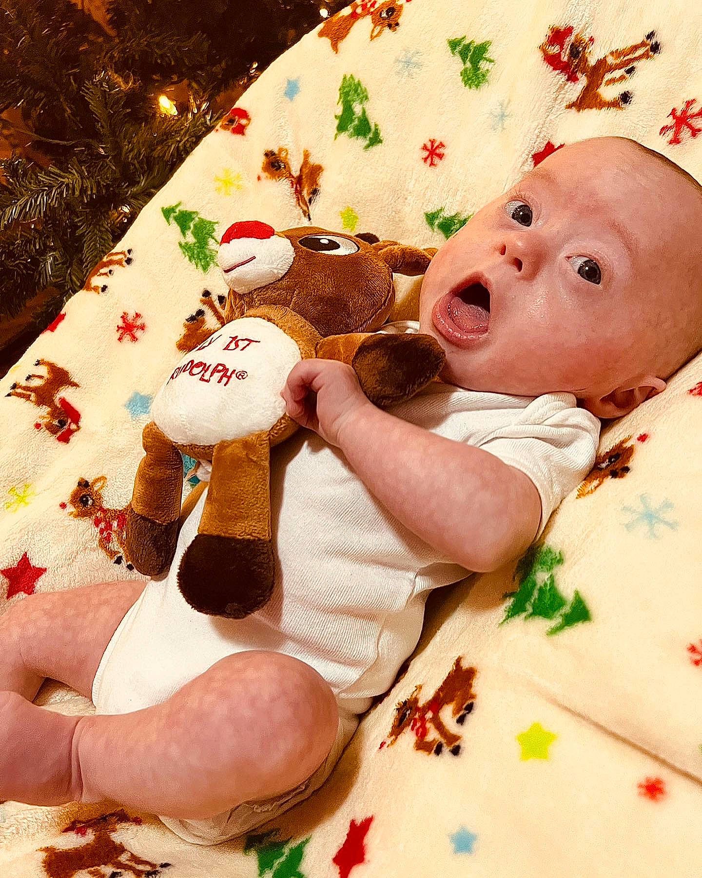 Lucian joined the competition — help win amazing prizes! baby, baby_sleeping, baby_toddler_clothing, child, comfort, event, foot, happy, holiday, human_leg, lap, linens, pattern, person, pink, room, skin, surprise, sweetness, textile