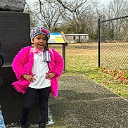 Mulaan is registered to the contest to win money with this photo: beanie, bonnet, cap, child, clothing, coat, face, female, footwear, girl, glove, hat, head, knitwear, pants, path, person, shoe, sweater, walkway