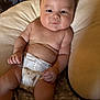 Treyvon is registered to the contest to win money with this photo: baby, bedding, casual, child, chubby, closeup, comfort, cushion, cute, diaper, expression, indoors, infant, person, portrait, resting, rolls, skin, soft, young