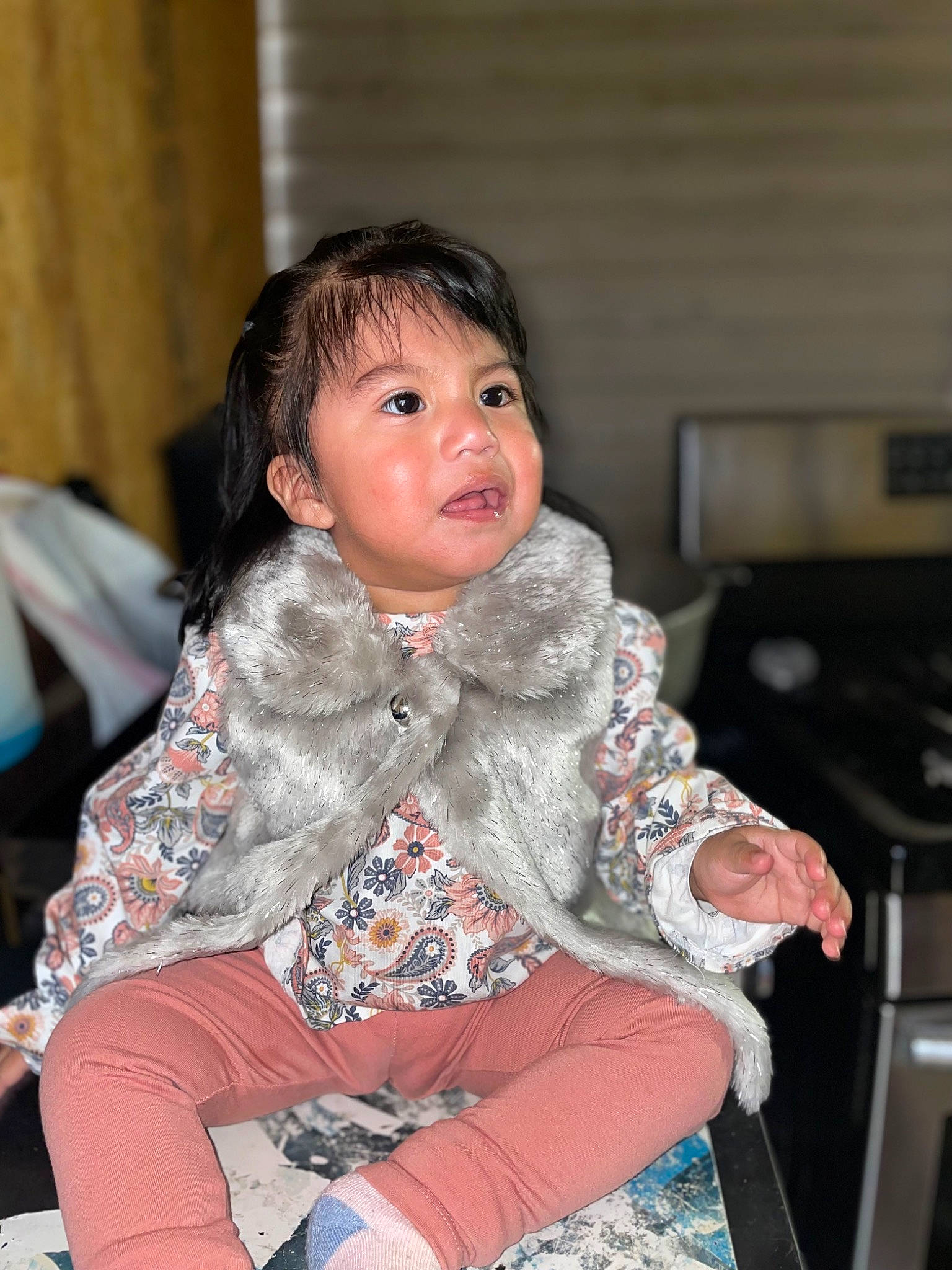 Saraí joined the competition — help win amazing prizes! baby, chair, cheek, event, fashion_design, fun, fur, fur_clothing, happy, iris, leisure, pattern, person, sitting, skin, sleeve, thigh, toddler, tradition, winter