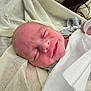 baby, newborn, smile, blanket, sleeping, face, infant, soft, wrapped, peaceful, cute, portrait, closeup, skin, head, resting, young, human, child, adorable