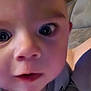Dean joined the competition — help win amazing prizes! arm, baby, big_eyes, blanket, cheeks, close_up, clothing, couch, eyes, face, forehead, indoor, infant, mouth, nose, onesie, person, portrait, surprised_expression, wooden_wall