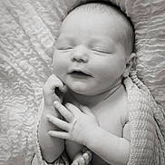Jasper is registered to the contest to win money with this photo: baby, newborn, sleeping, blanket, wrapped, black_and_white, peaceful, infant, cute, soft_texture, fingers, toes, closeup, portrait, child, sleep, serene, resting, cocooned, toddler