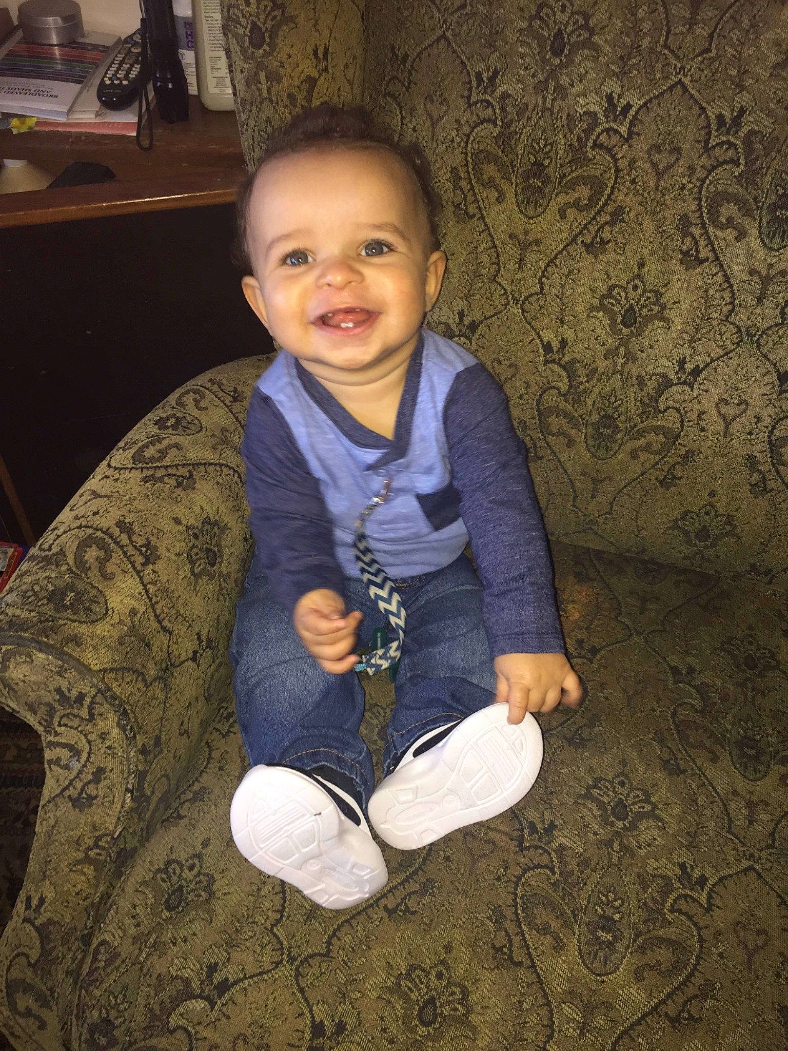 Shy is registered to the contest to win money with this photo: boy, child, cool, day, eye, fun, girl, human, infant, person, product, sitting, skin, smile, standing, toddler