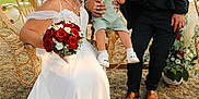 Valentino participe au concours pour gagner de l'argent avec cette photo : bouquet, bride, celebration, chair, child, dress, event, family, flower, formal, grass, groom, happy, kiss, love, nature, outdoor, portrait, suit, wedding