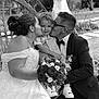 Valentino a rejoint le concours — aidez-le/la à gagner de superbes lots ! black_and_white, bouquet, bride, celebration, chair, child, dress, family, flowers, grass, groom, happy, kiss, love, outdoor, portrait, roses, smile, suit, wedding