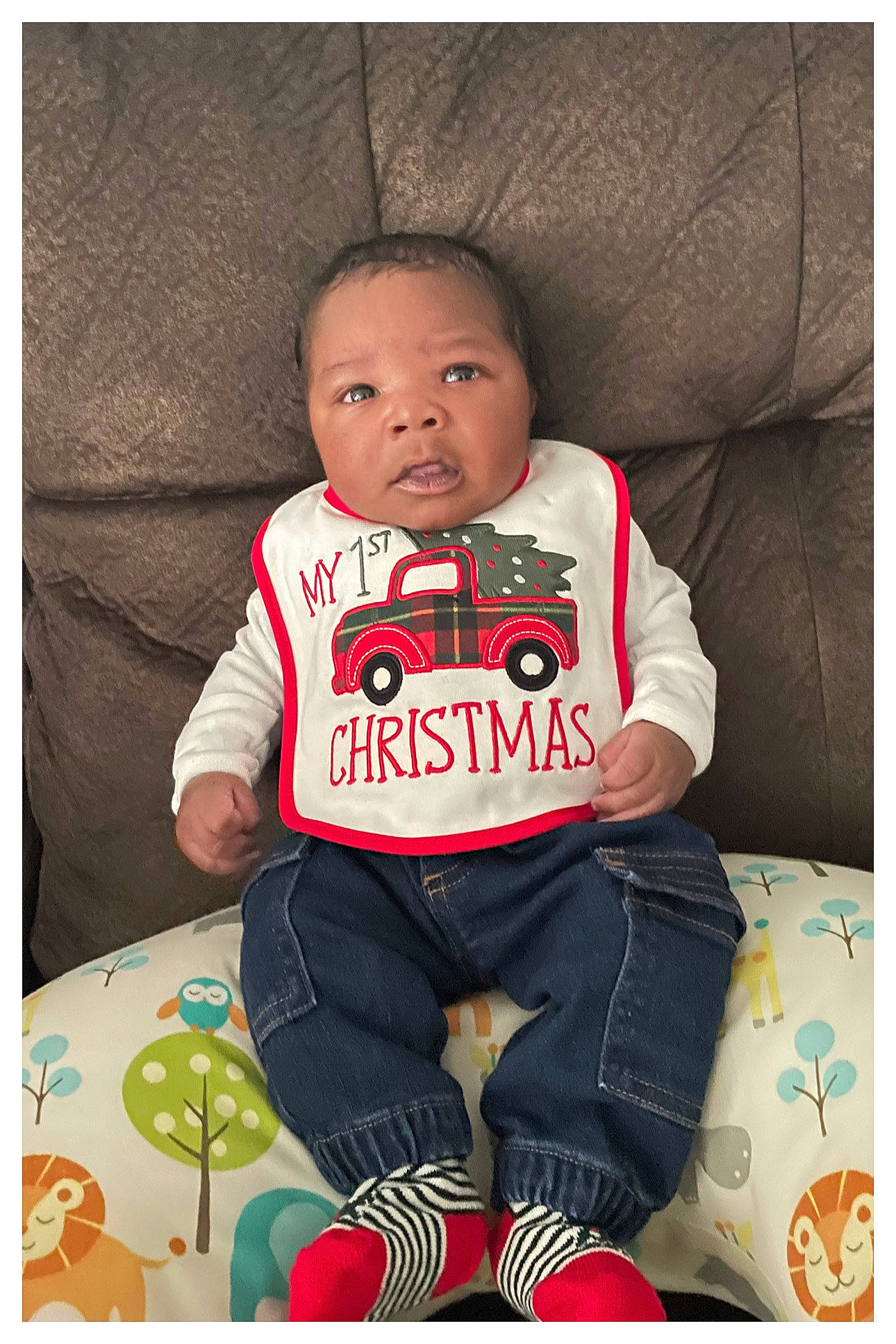 Kason joined the competition — help win amazing prizes! baby, baby_toddler_clothing, carmine, chair, cheek, comfort, happy, human_body, jacket, jersey, leg, linens, long_sleeved_t_shirt, person, sitting, sleeve, sock, sportswear, t_shirt, thigh