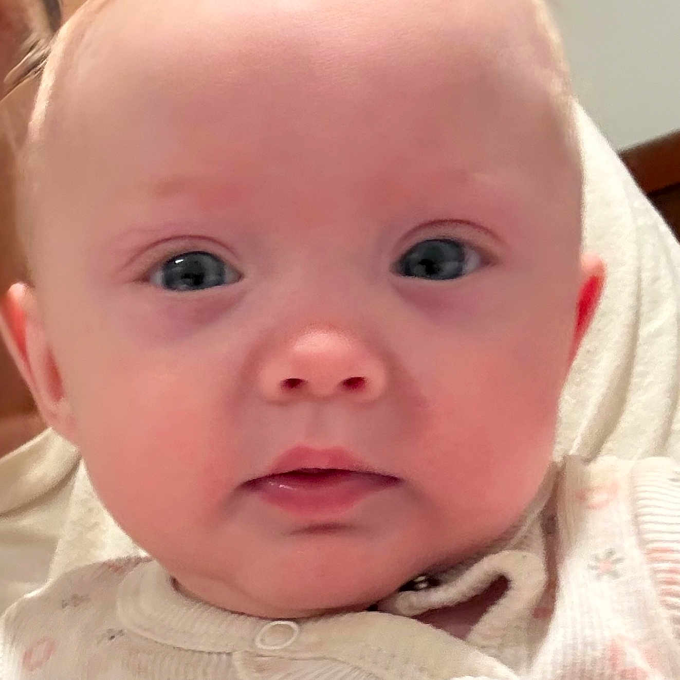 Embreigh joined the competition — help win amazing prizes! baby, infant, face, close_up, eyes, expression, cute, child, young, portrait, skin, nose, mouth, clothing, human, person, indoor, soft_light, head, newborn
