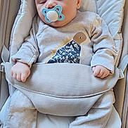 Cooper joined the competition — help win amazing prizes! baby, sleeping, pacifier, dinosaur_print, onesie, baby_seat, infant, child, soft_fabric, cute, resting, cozy, small_hands, footed_pajamas, comfort, indoor, peaceful, childcare, young, naptime