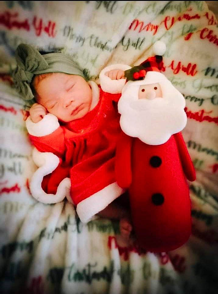 Amari joined the competition — help win amazing prizes! baby, carmine, child, christmas, christmas_decoration, christmas_eve, christmas_ornament, event, fictional_character, font, happy, holiday, love, ornament, person, santa_claus, souvenir, toddler, toy, tree