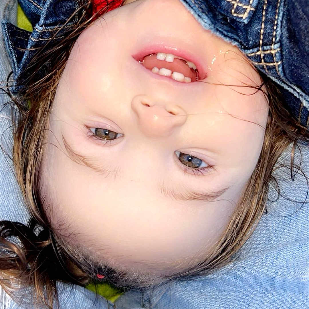 Ansleigh joined the competition — help win amazing prizes! accessories, baby, baseballcap, bodypart, cap, clothing, coat, face, happy, hat, head, jacket, jeans, mouth, pants, person, photography, portrait, smile, teeth