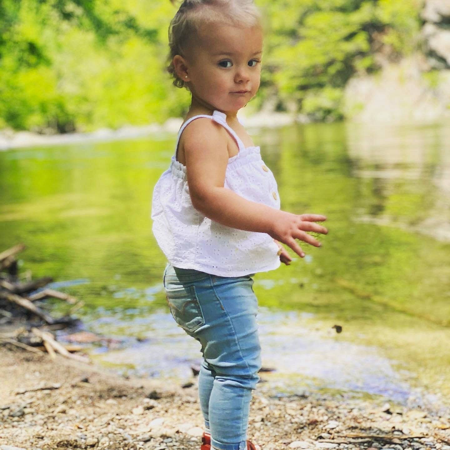 Emmie Lou joined the competition — help win amazing prizes! bank, beauty, body_of_water, botany, flash_photography, gesture, grass, hand, happy, lake, leaf, leisure, natural_environment, natural_landscape, people_in_nature, person, shoulder, sunlight, waist, water