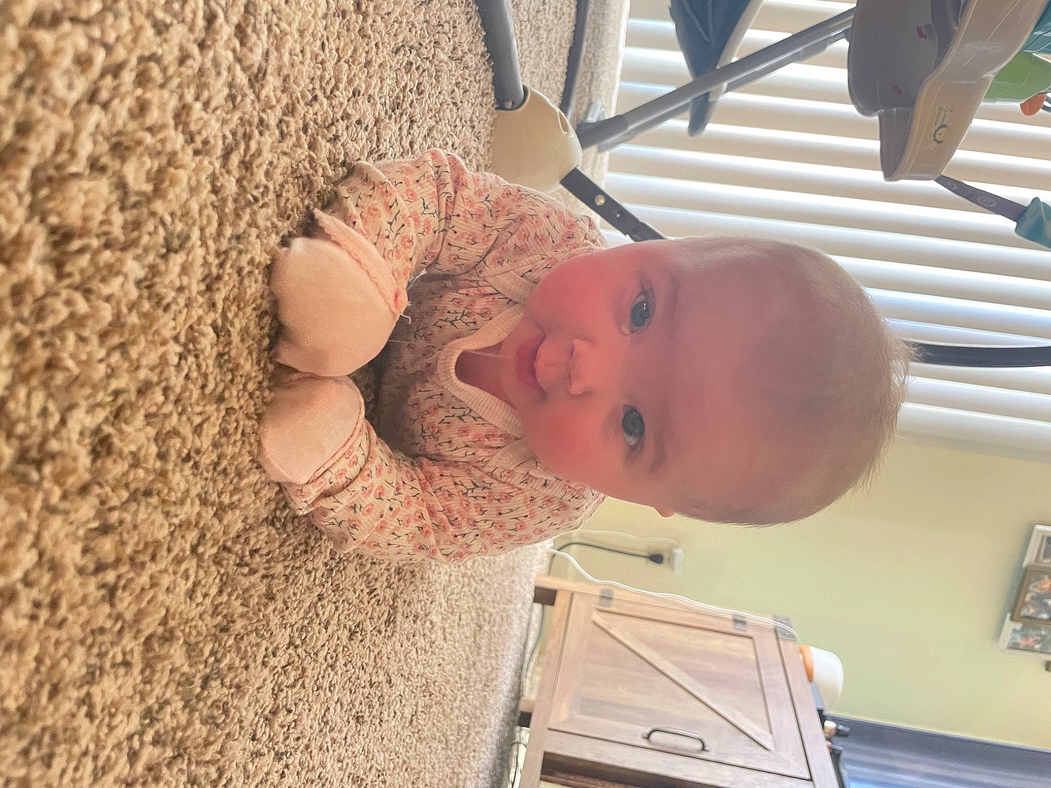 Mckinley is registered to the contest to win money with this photo: baby, baby_toddler_clothing, child, chin, comfort, eye, flooring, fun, hat, head, house, nose, person, room, skin, smile, soil, sun_hat, toddler, vacation