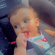 Jaylynn joined the competition — help win amazing prizes! baby, child, car_seat, seatbelt, hand, face, expression, sparkles, filter, indoors, infant, clothing, straps, cute, portrait, young_child, window, seat, safety, car